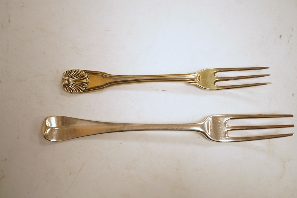 A collection of assorted mainly 18th century silver three pronged table forks, including a pair of dog nose, 19.1cm, most with indistinct or rubbed marks, together with a similar collection of thirteen silver three prong